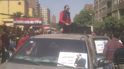 انتخابات الرئاسة المصرية 2018.. شحتة كاريكا يشارك في الاحتفالات مع أهالي حدائق القبة 