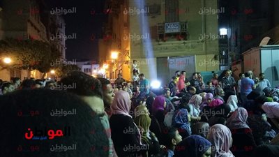صور| توافد المواطنين على احتفالية انشادية في شارع المعز