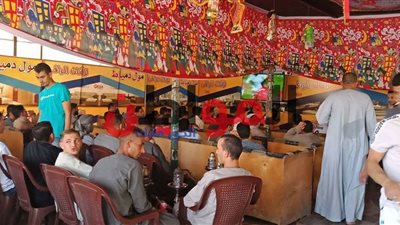 صور| الجماهير على كافيهات الجيزة لمتابعة مباراة مصر وأوروجواي في مونديال 2018