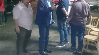 صور.. الأمن والمحافظة في موقع انهيار صومعة قمح الإسكندرية