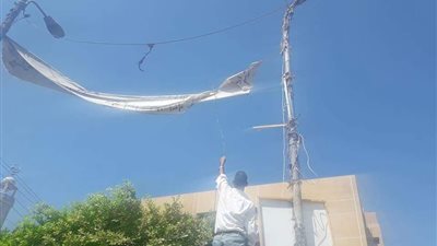 حملة لرفع الإعلانات غير المرخصة بـ بني مزار في المنيا