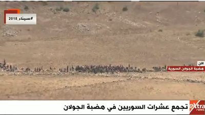 بث مباشر .. تجمع عشرات السوريين في هضبة الجولان