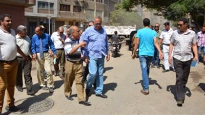 حملة نظافة مكبرة بـ شارع الأقصر فى إمبابة 