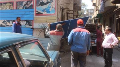صور.. حملة موسعة في حي الساحل لرفع التعديات والإشغالات 