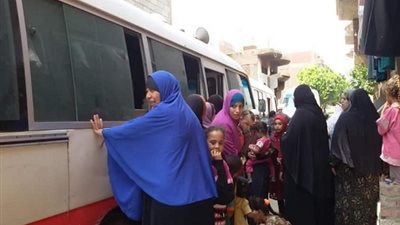 صور. الكشف على 362 مريض بالقافلة الطبية العلاجية ببني سويف
