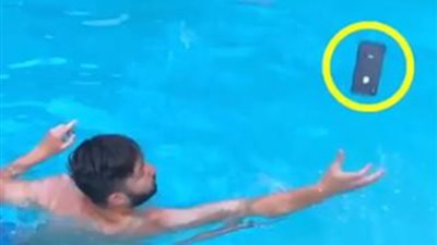 فيديو.. شاب ينقذ هاتفه المحمول من سقطات طريفة