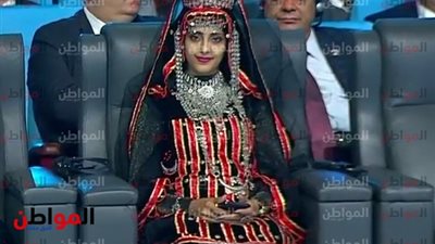 قبل الاستغراب .. هذا زي العالية حمزة في منتدى شباب العالم .. فمن هى ؟