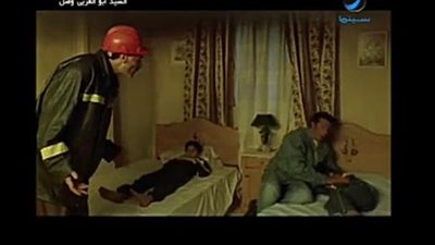 يا علي يا علاء اصحو البيت بيولع.. سيدة تتمسك بالغسيل رغم الحريق