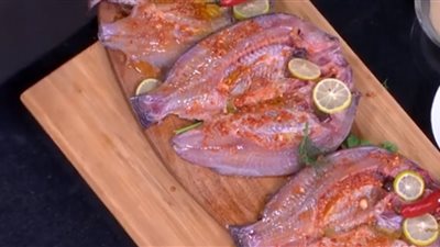 أكلتك عندنا.. طريقة عمل تتبيلة سمك البلطي السنجاري الشهي