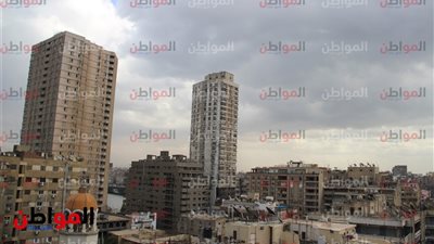 صور| الأمطار تملأ سماء الجيزة 