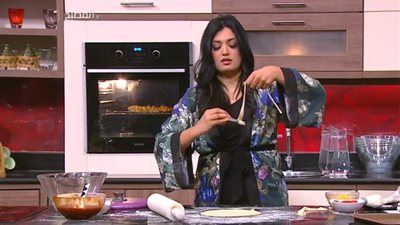 فيديو| برنامج المطبخ يقدم طريقة عمل بيتزا الطاسة