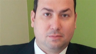 خاص|محلل مالي : تصنيف «فيتش» من شأنه تخفيض قيمة الدولار في مصر