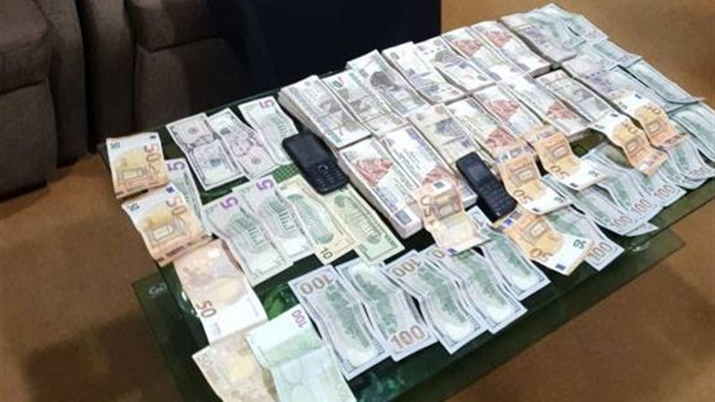 ضبط تاجر نقد أجنبي