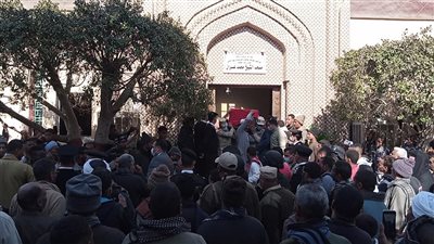 بالصور.. أهالي نجع حمادي يشيعون جثمان شهيد الواجب الوطني