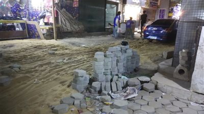 صور.. رصف سوق السد العالي بـ«البساتين»