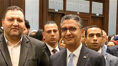 محمود التراس رفقة وزير التموين في أحد المؤتمرات الوطنية